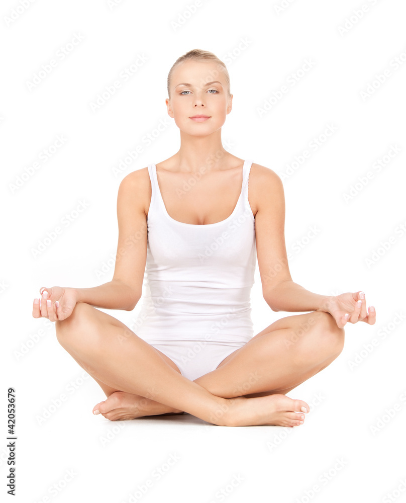 woman in cotton undrewear practicing lotus pose woman in cotton undrewear practicing lotus pose