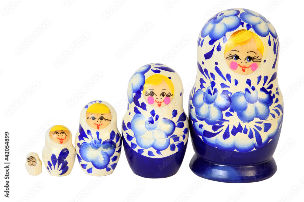 Set of five blue painted Russian matryoshkas isolated on white Set of five blue painted Russian matryoshkas isolated on white
