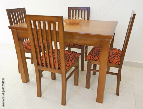 Dining table and chairs in apartment