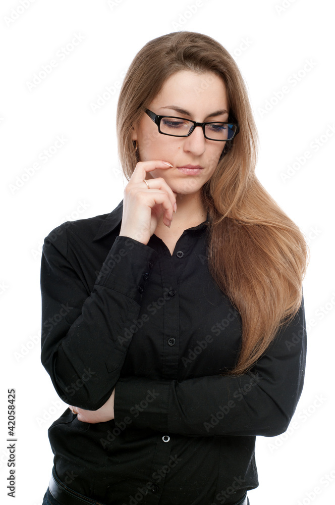 Young girl with glasses thoughtful and sad. Young girl with glasses thoughtful and sad.