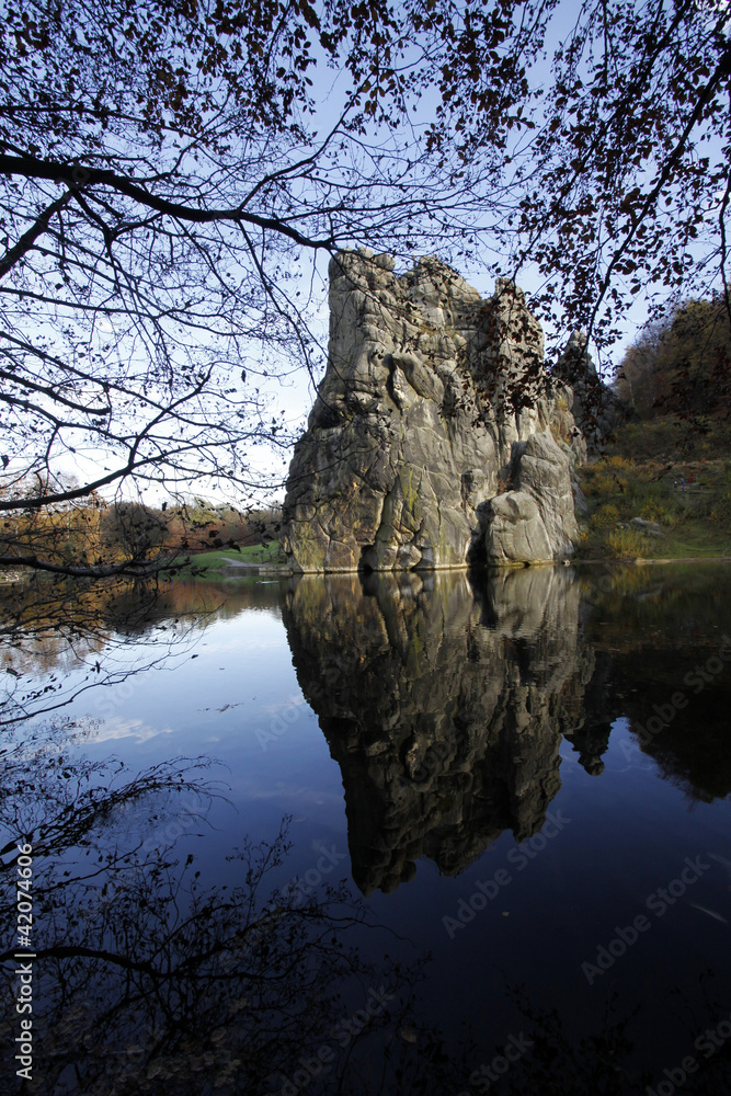 Externsteine mit Teich StockFoto Adobe Stock