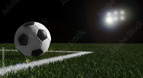 Soccer ball on the field of stadium with light © siraanamwong
