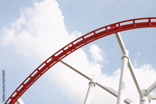 Part curve of red and white roller coaster rail. © keerati