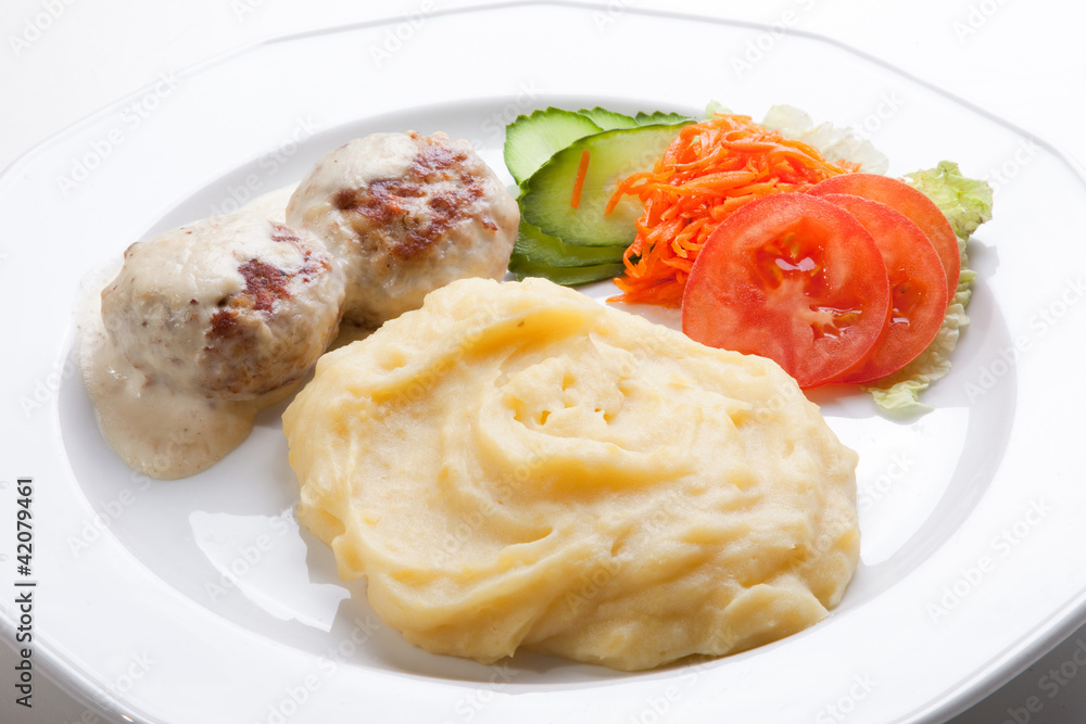 meat cutlet with mashed potatoes and fresh salad