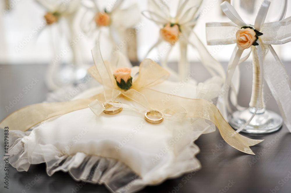 Closeup of golden wedding rings . DOF focus on diamonds Closeup of golden wedding rings . DOF focus on diamonds