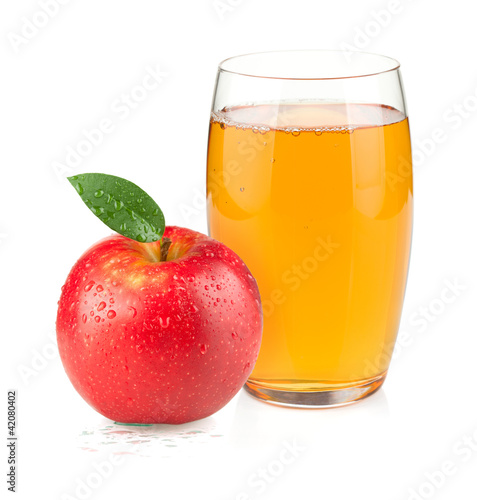Apple juice in a glass and red apple