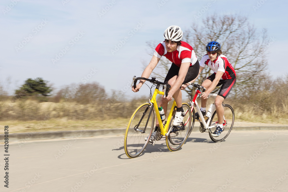 Cyclists Riding Cycles On Open Road