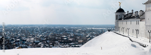 Wall of Tobolsk Kremlin and old part of Tobolsk, Russia