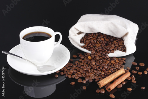 Coffee cup and coffee beans from bag