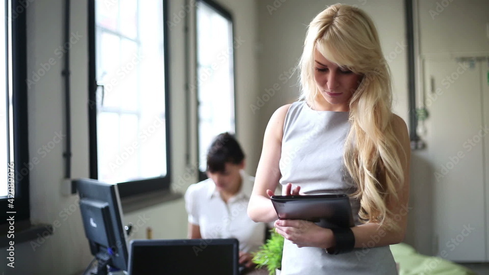 Portrait of smiling businesswoman with tablet computer Portrait of smiling businesswoman with tablet computer