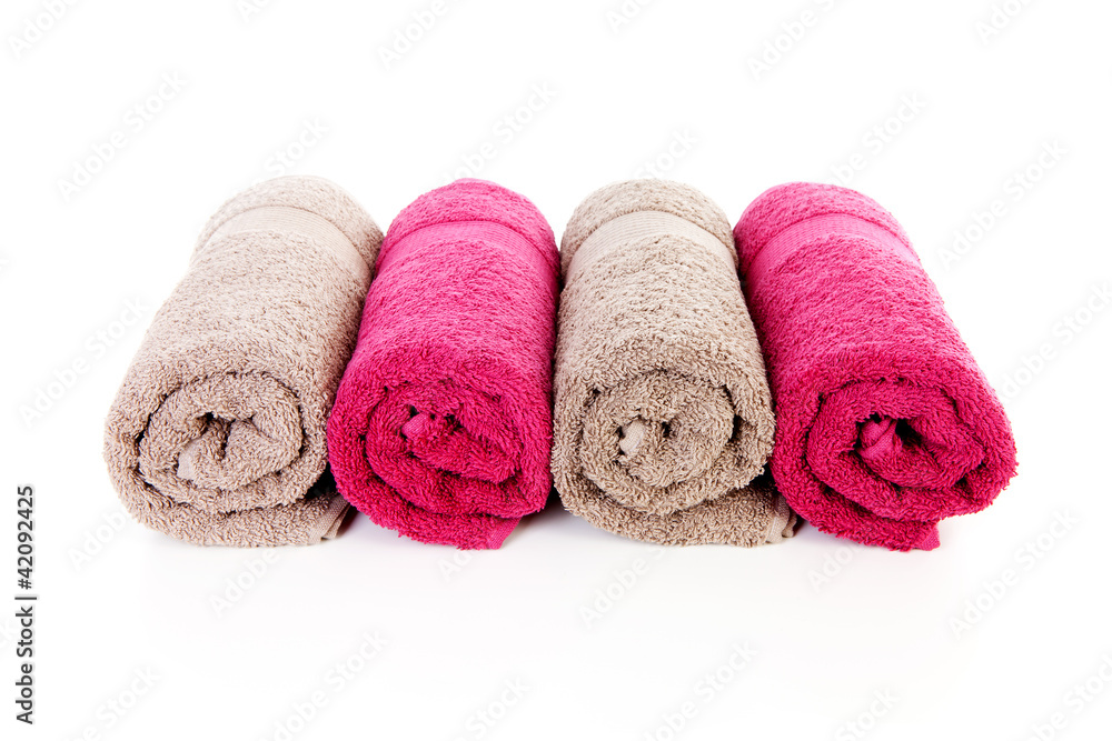 Four rolled colorful towels Four rolled colorful towels
