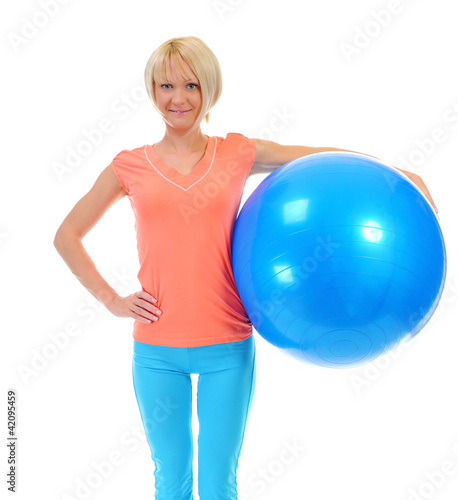 Young woman with blue ball