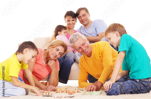 family playing on carpet