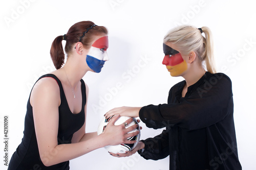 Принти на полотні Football soccer fans fighting over the ball