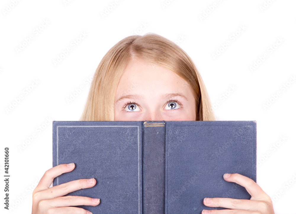 Girl reading book looking up Girl reading book looking up
