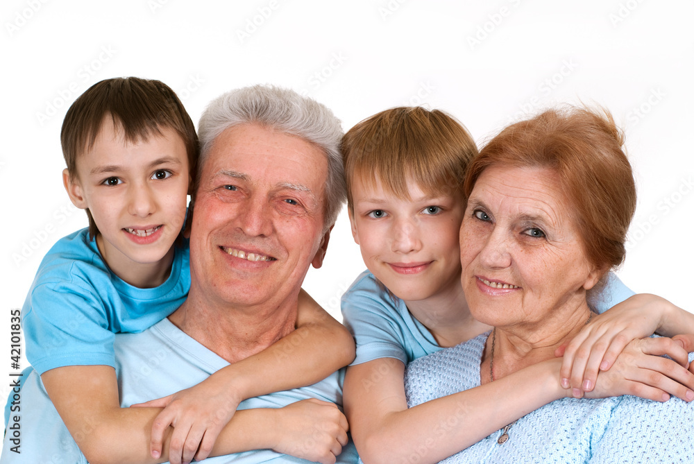 Happy Caucasian grandparents with happy children fooled Happy Caucasian grandparents with happy children fooled