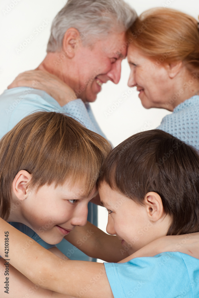Happy Caucasian grandparents with nice children fooled Happy Caucasian grandparents with nice children fooled