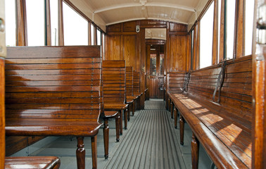 Fotobehang Trein Houten interieur van oude trein  © Chris Willemsen