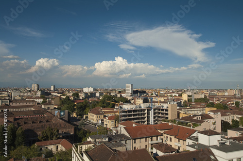 View of Milan Skyline from above with clouds photo