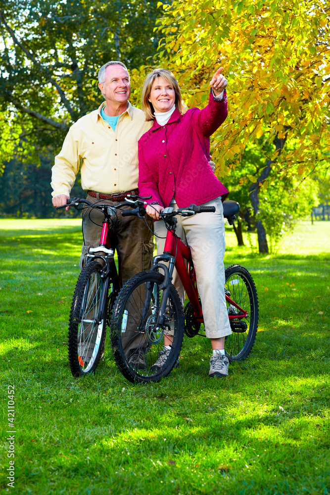 Senior couple cycling