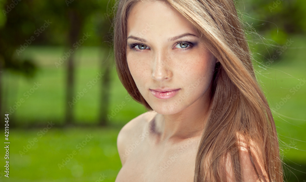Portrait of attractive girl with long hair