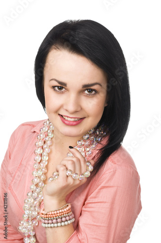 A beautiful woman with glass necklace. The natural portrait .