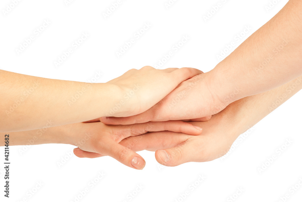 Hands on top of each other. Symbolic picture. Hands on top of each other. Symbolic picture.