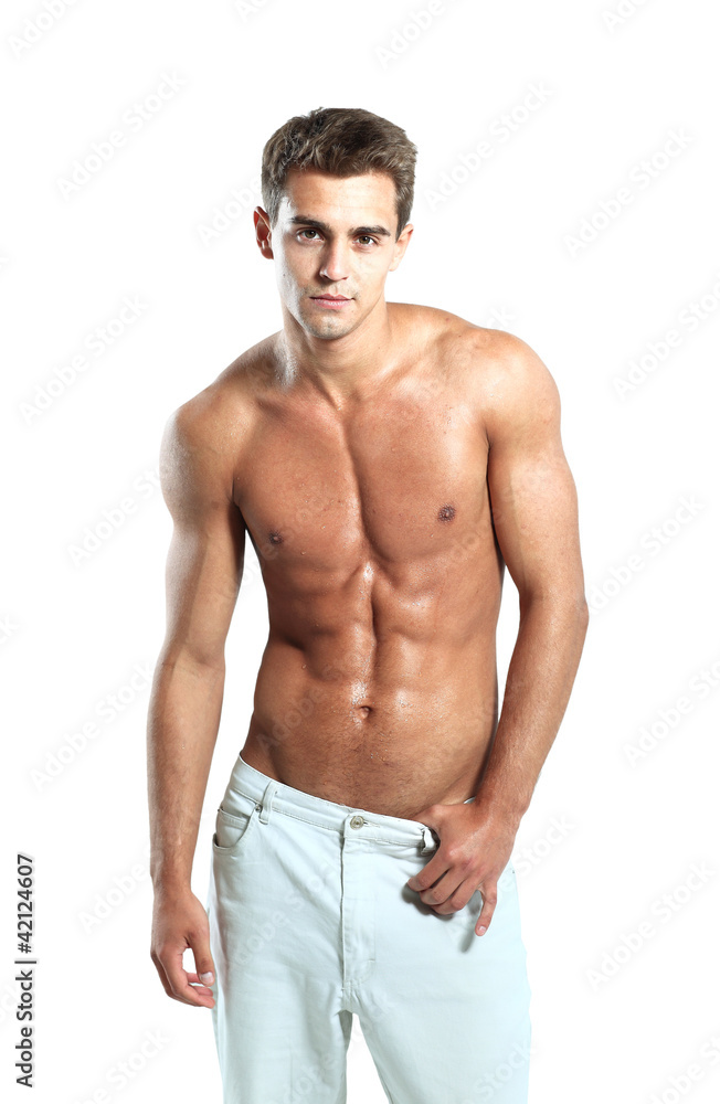 a young male model posing his muscles