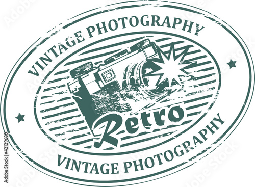 Stamp with old film camera and the word Vintage Photography