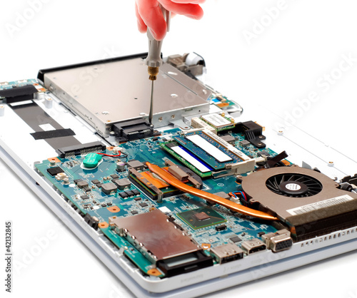 man repair laptop