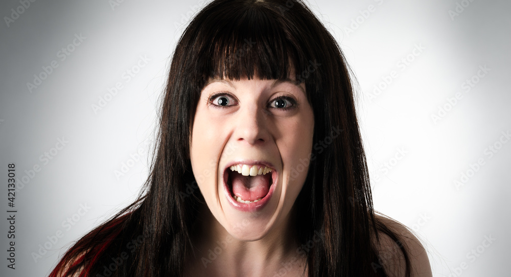 Woman screaming in horror or terror Woman screaming in horror or terror