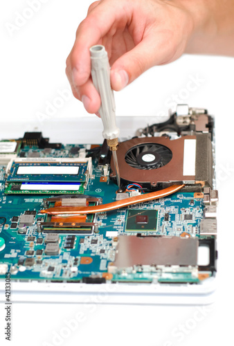 man repair laptop