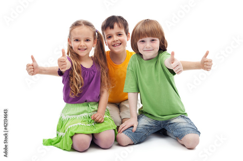 Three kids giving thumbs up sign #42134643