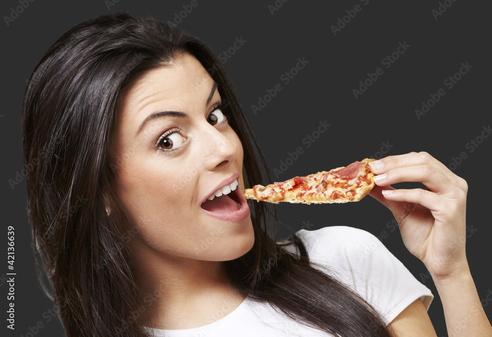 woman eating pizza woman eating pizza