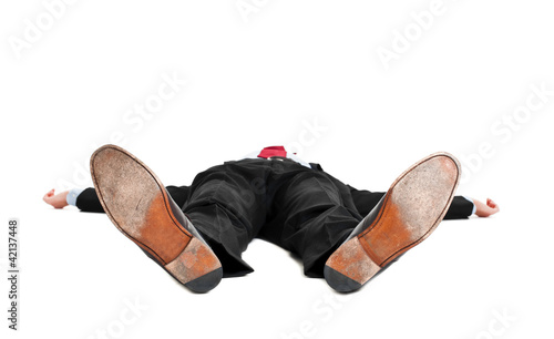 Businessman laying down on white background