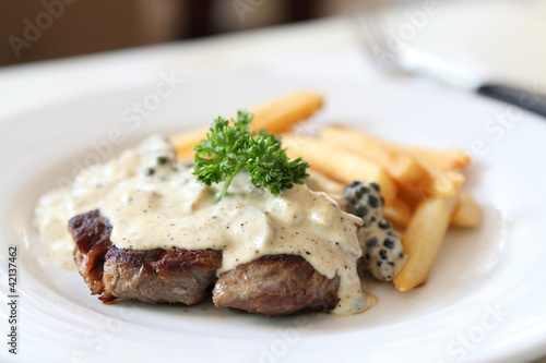 Fotografi Beef steak with white sauce