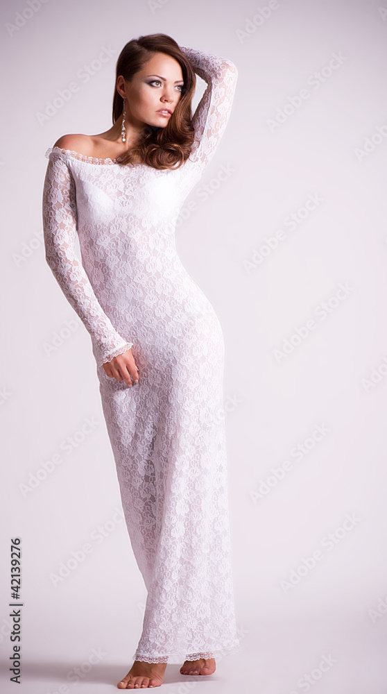 Young sexy woman in white bridal dress Young sexy woman in white bridal dress