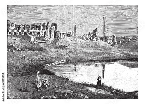 Karnak (Egypt) ruins of the great temple and obelisk, vintage en