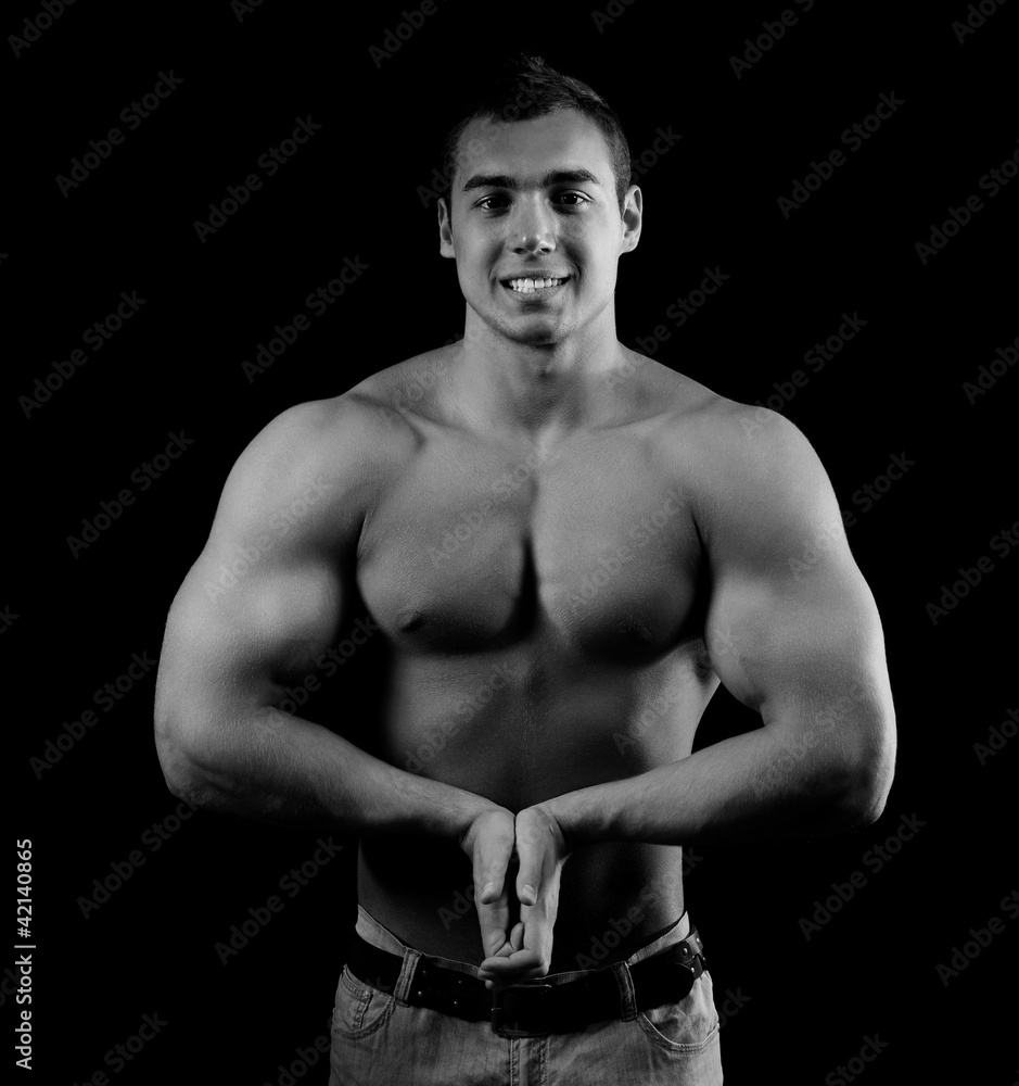 Bodybuilder showing his muscles Bodybuilder showing his muscles
