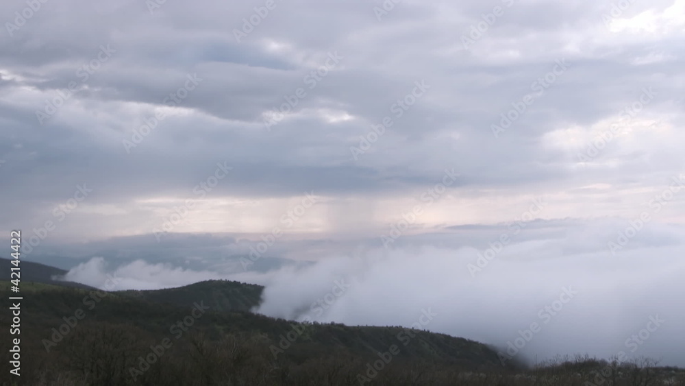Timelaps of moving fog in mountains Timelaps of moving fog in mountains