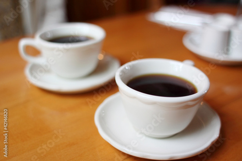Coffee cups on a table.