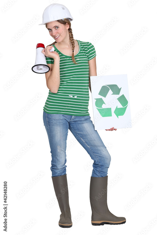 crafswoman holding loudspeaker shows recycling logo crafswoman holding loudspeaker shows recycling logo