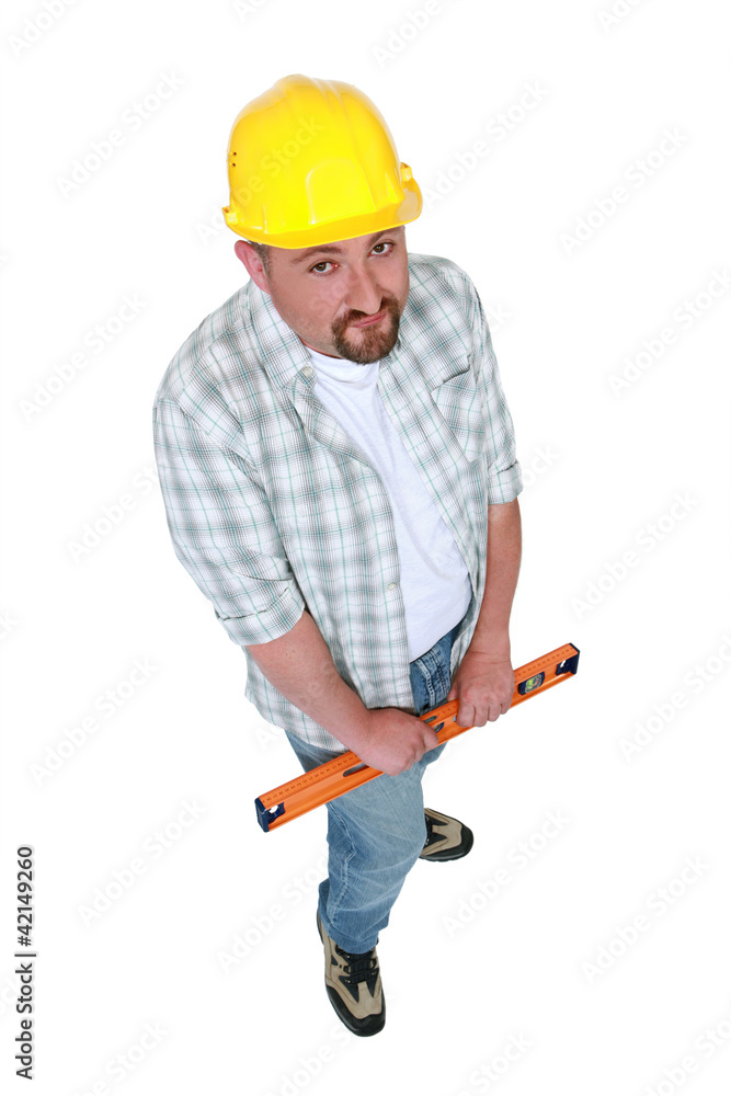 Construction worker with a spirit level Construction worker with a spirit level
