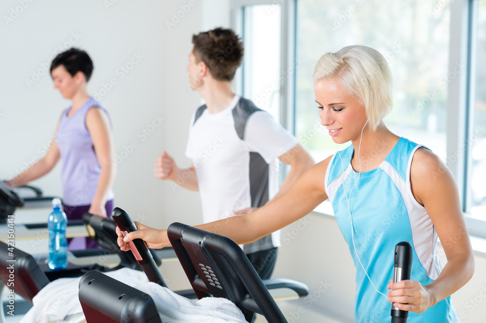 Fitness young people on treadmill running exercise Fitness young people on treadmill running exercise