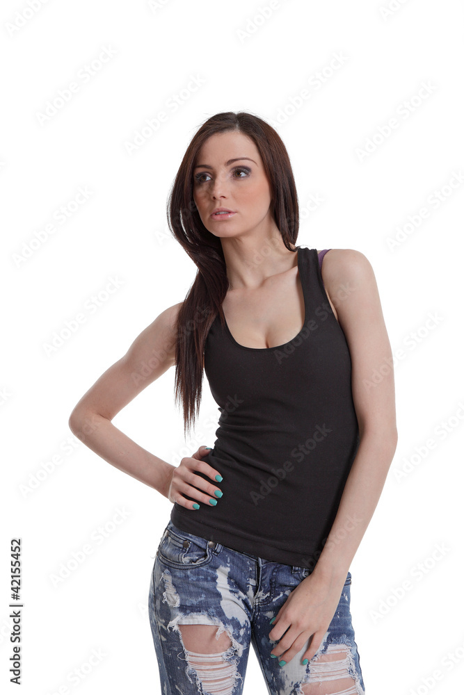 Girl in jeans posing in studio Girl in jeans posing in studio