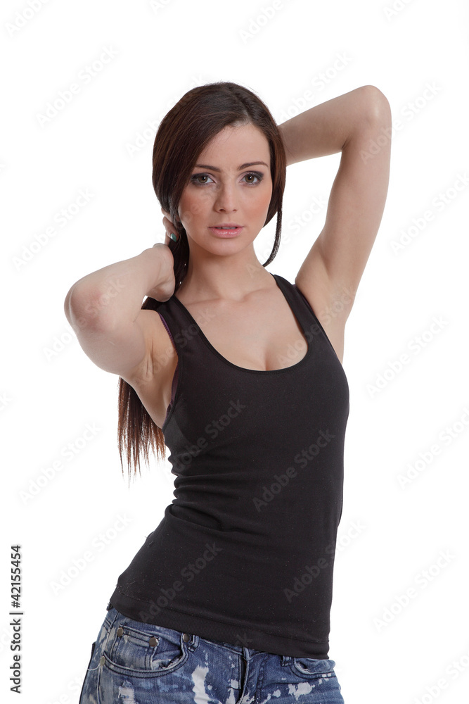 Attractive girl posing in jeans and holding her hair Attractive girl posing in jeans and holding her hair