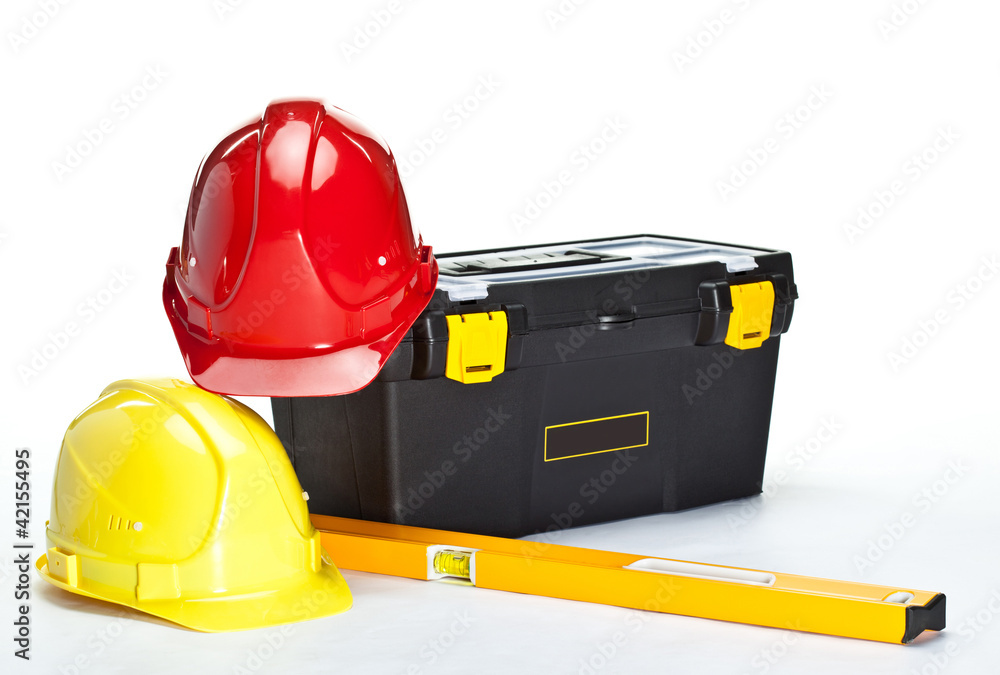 Construction toolbox, level and hardhats Construction toolbox, level and hardhats