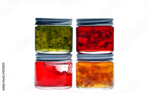 Four jam jar isolated on white background