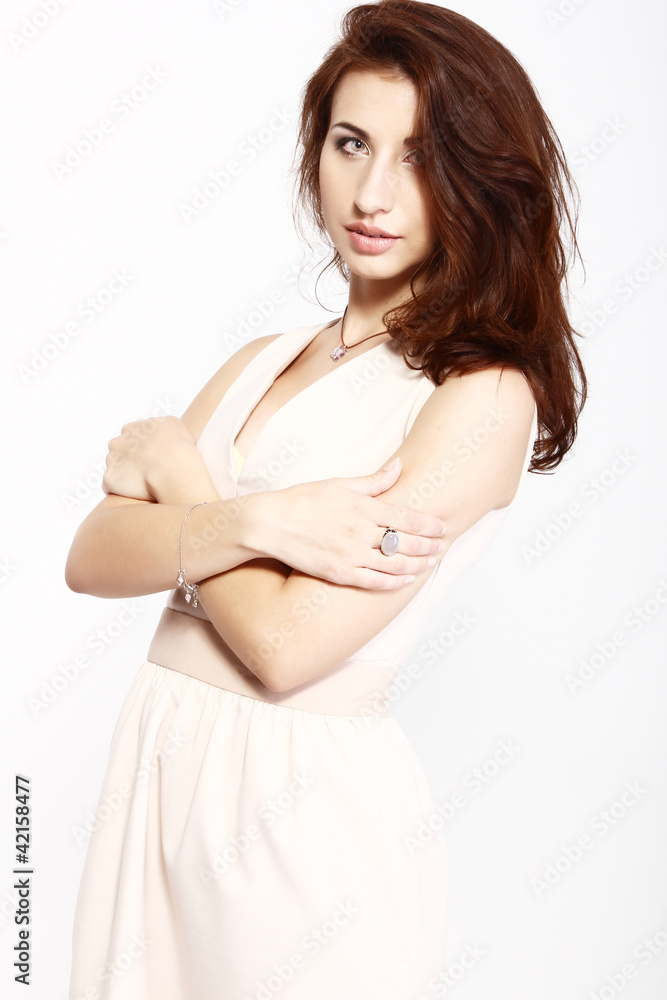 Young attractive successful fashion woman in elegant white dress Young attractive successful fashion woman in elegant white dress