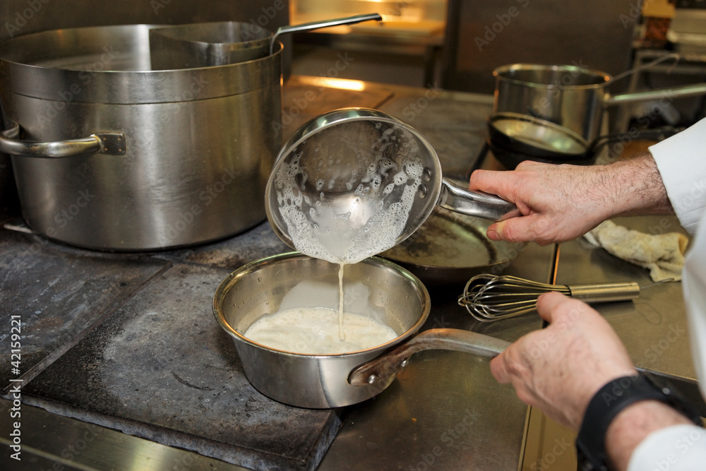 Chef is cooking sauce Chef is cooking sauce